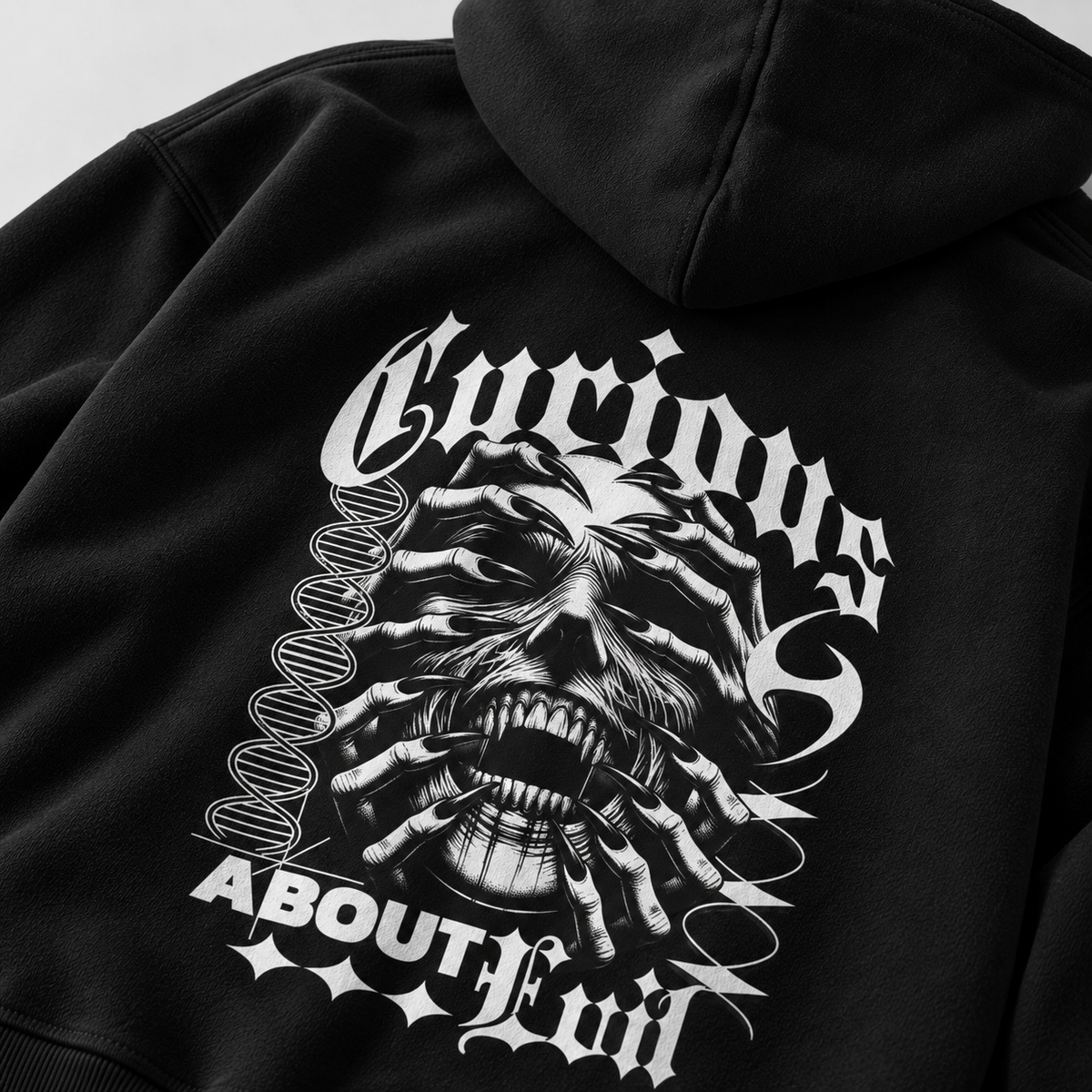 Belarté Curious About Evil black zip hoodie — angled back print close-up