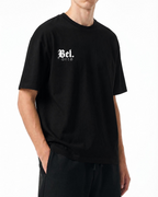 Belarté Chaos Cubes black cotton T-shirt, angled front view on model