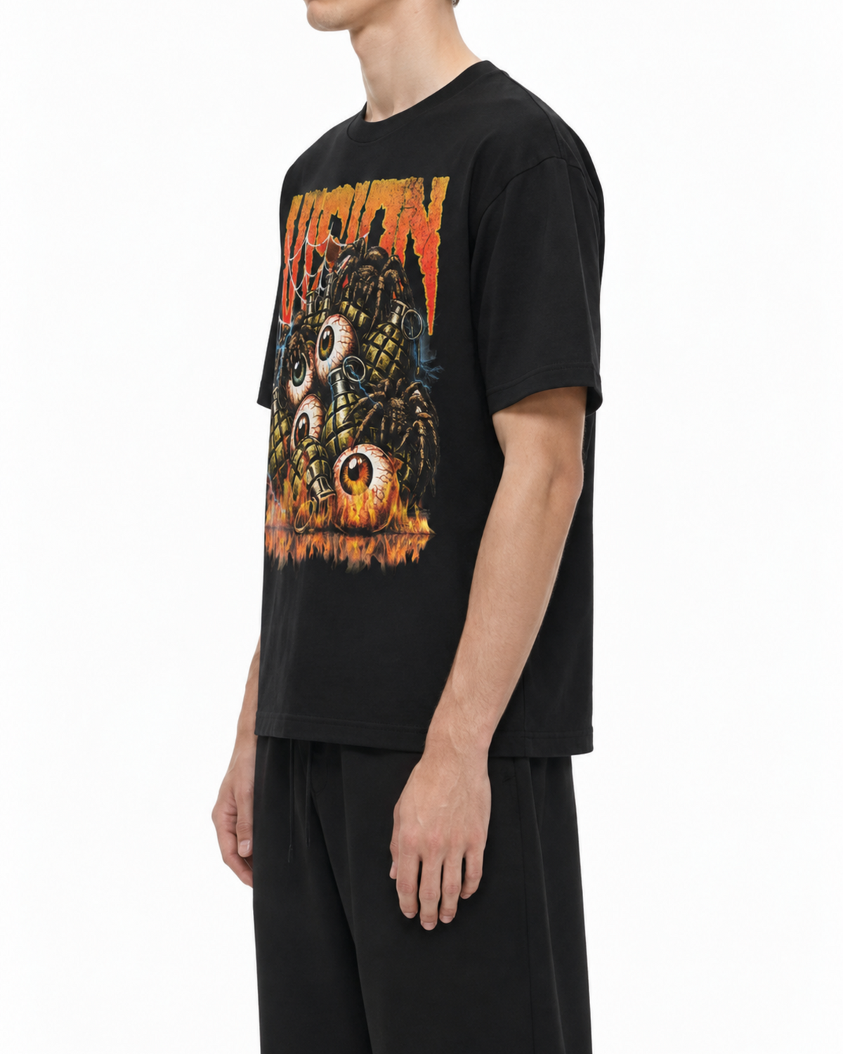 Black Belarté Vision T-shirt on a model, side view showing the loose fit