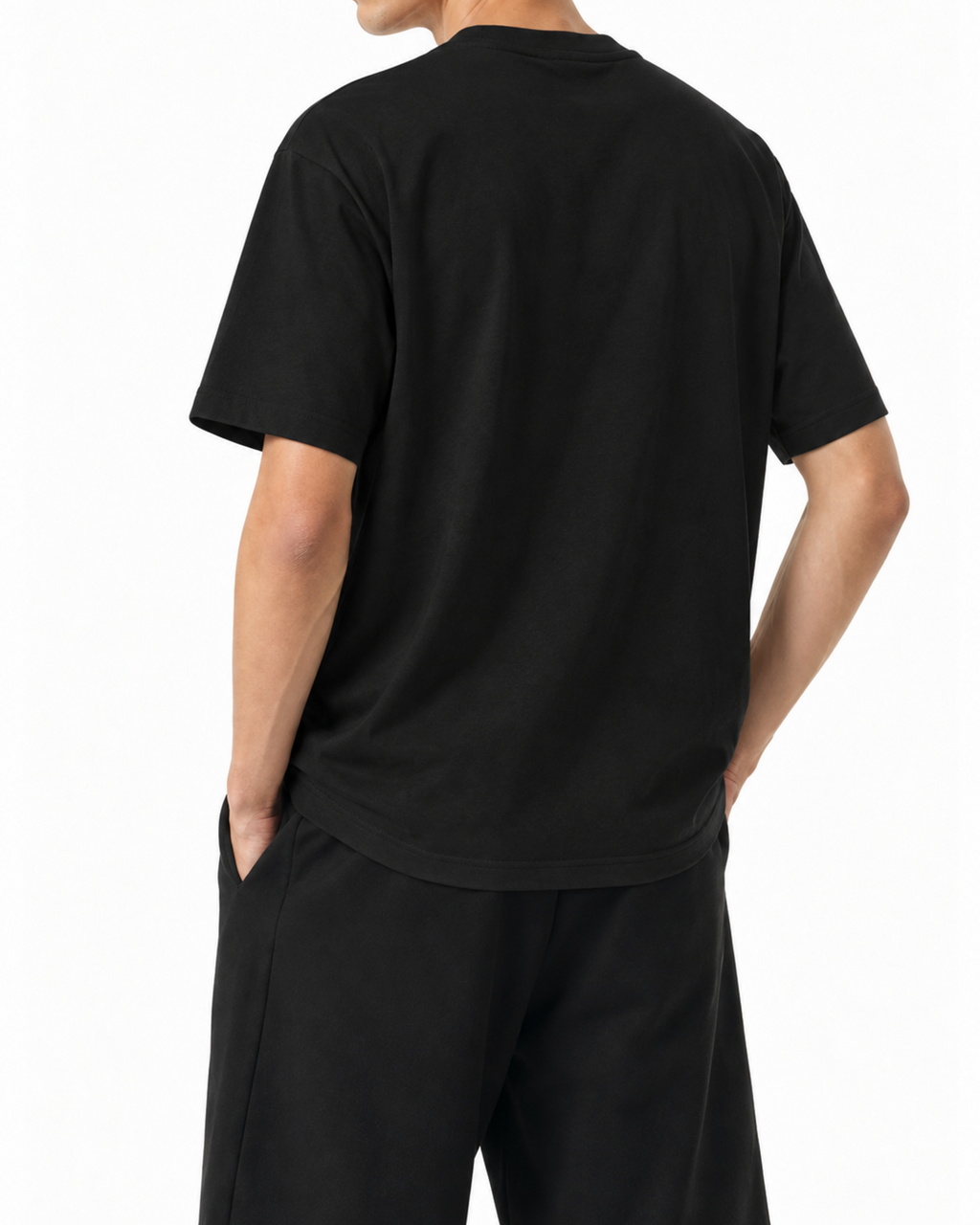 Plain back of the black Belarté Vision T-shirt worn by a model