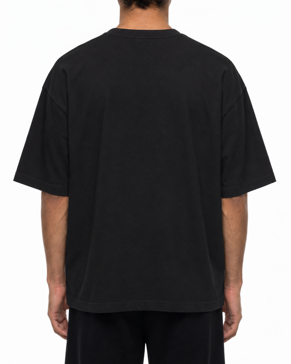 Plain back of the black Belarté Six Seven T-shirt on a model