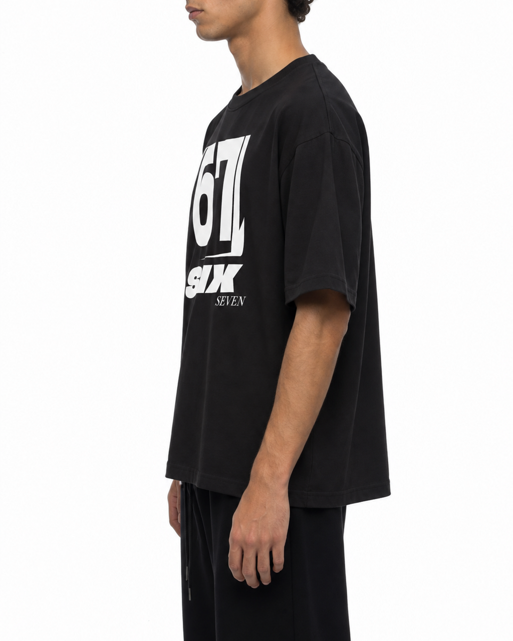 Side view of the black Belarté Six Seven graphic T-shirt on a model