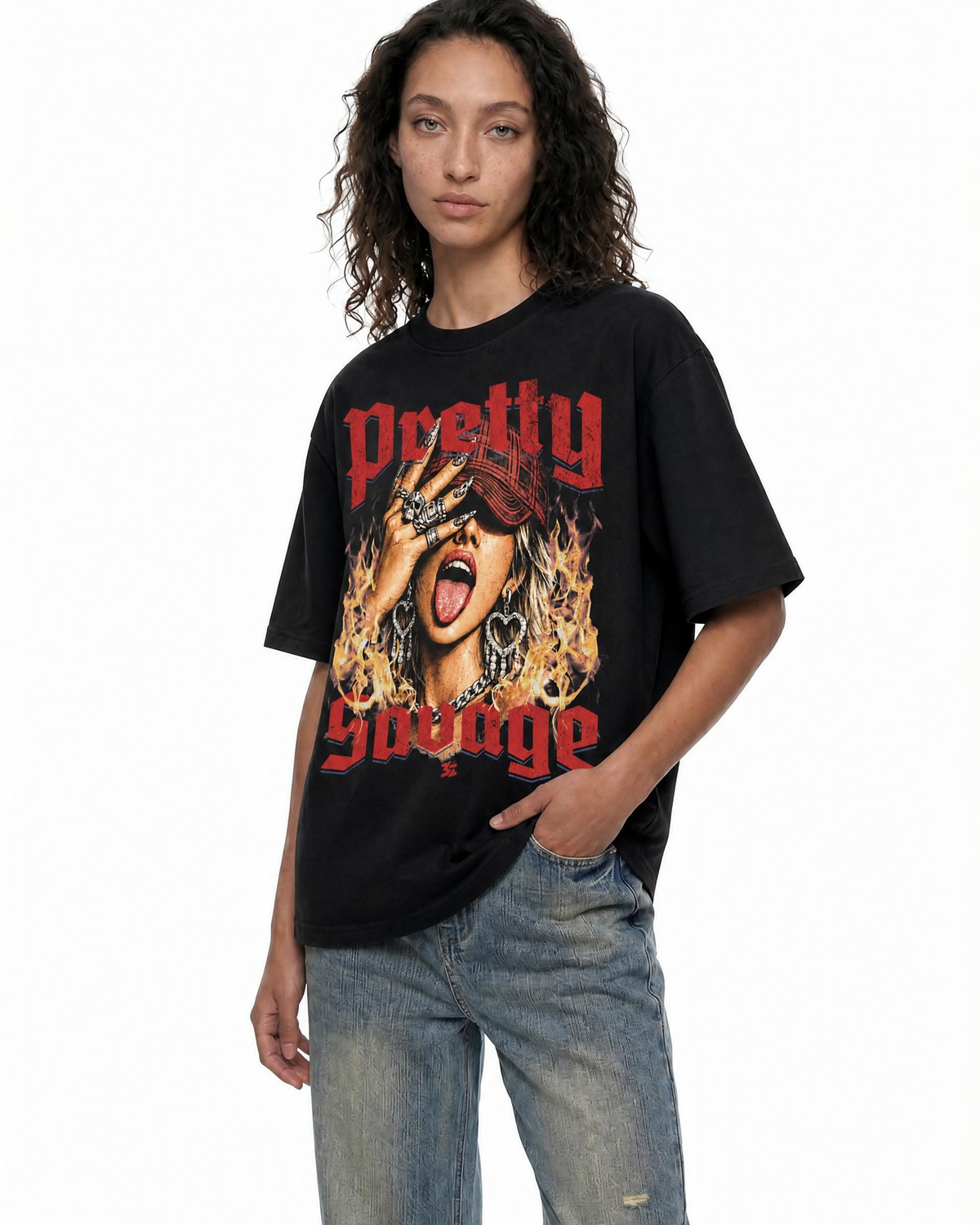 Model wearing the black Belarté Pretty Savage T-shirt with portrait graphic, angled front view.
